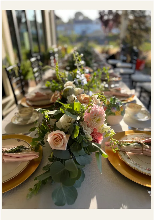 Opening photograph from the Guide: flowers, candles, and a welcoming table